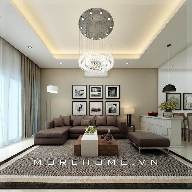Mẫu sofa hiện đại với kiểu dáng góc L bọc da màu nâu mang đến cảm giác ấm cúng, thử giãn cho phòng khách chung cư